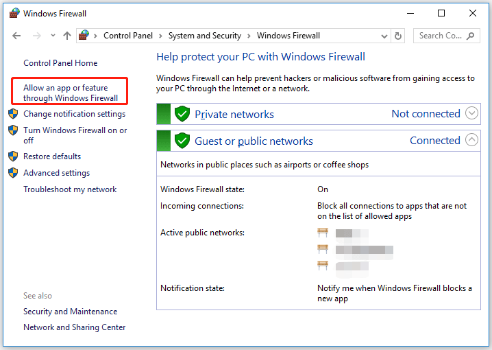 Haga clic en Permitir una aplicación o función a través del firewall de Windows