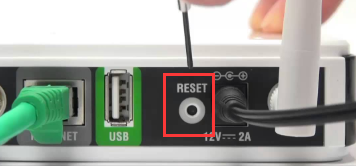 insert the smal pin into the reset