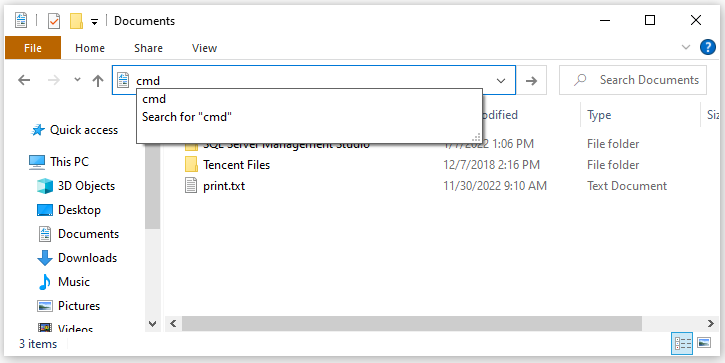 type cmd in the search bar of Windows File Explorer